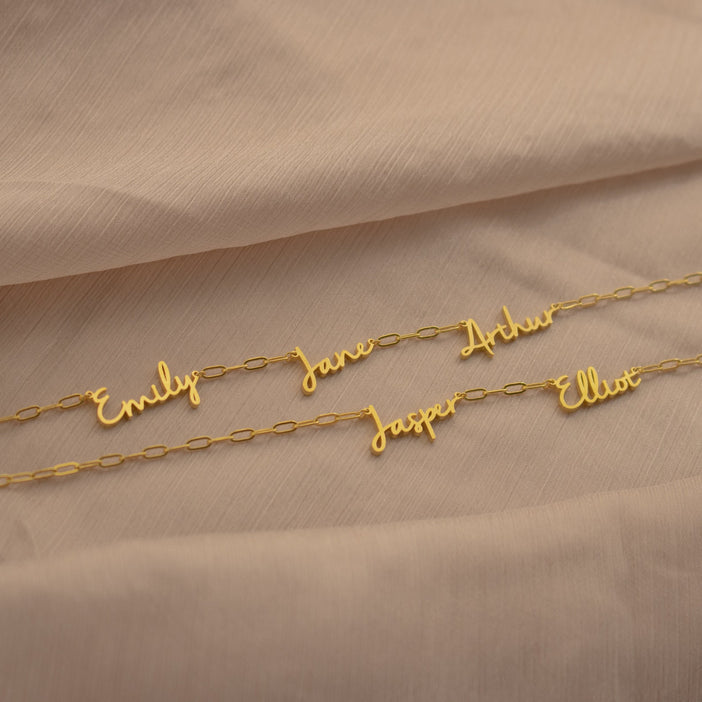 Nella Multiple Name Necklace in Paperclip Chain