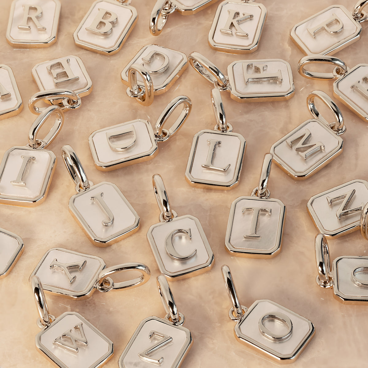 Mother of Pearl Initial Charm in Silver