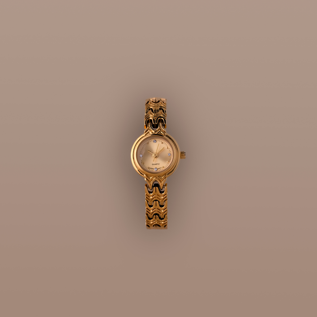 Flatlay of our Wavy Link Timepiece watch on a beige background