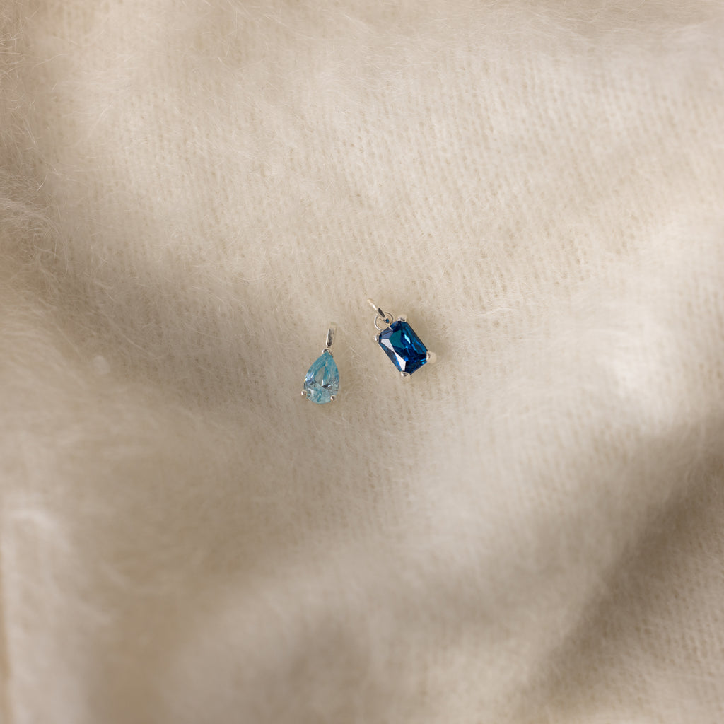 Silver 6mm Aquamarine Pear-cut Birthstone Charm and 6mm Blue Zircon Baguette-cut Birthstone Charm with jump rings