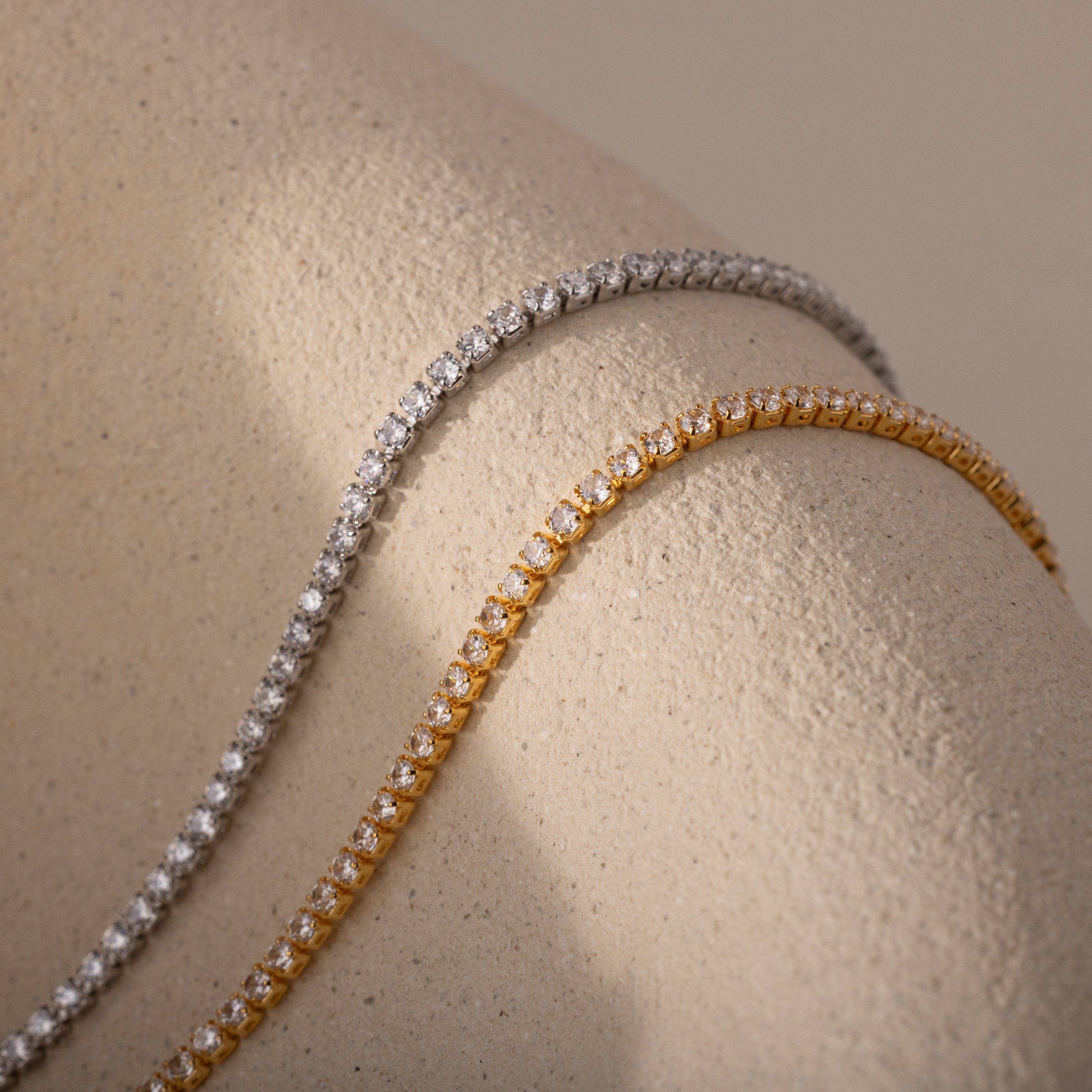 Side-by-side comparison of two Diamond Tennis Choker Necklaces—one in 18K gold and the other in White Gold
