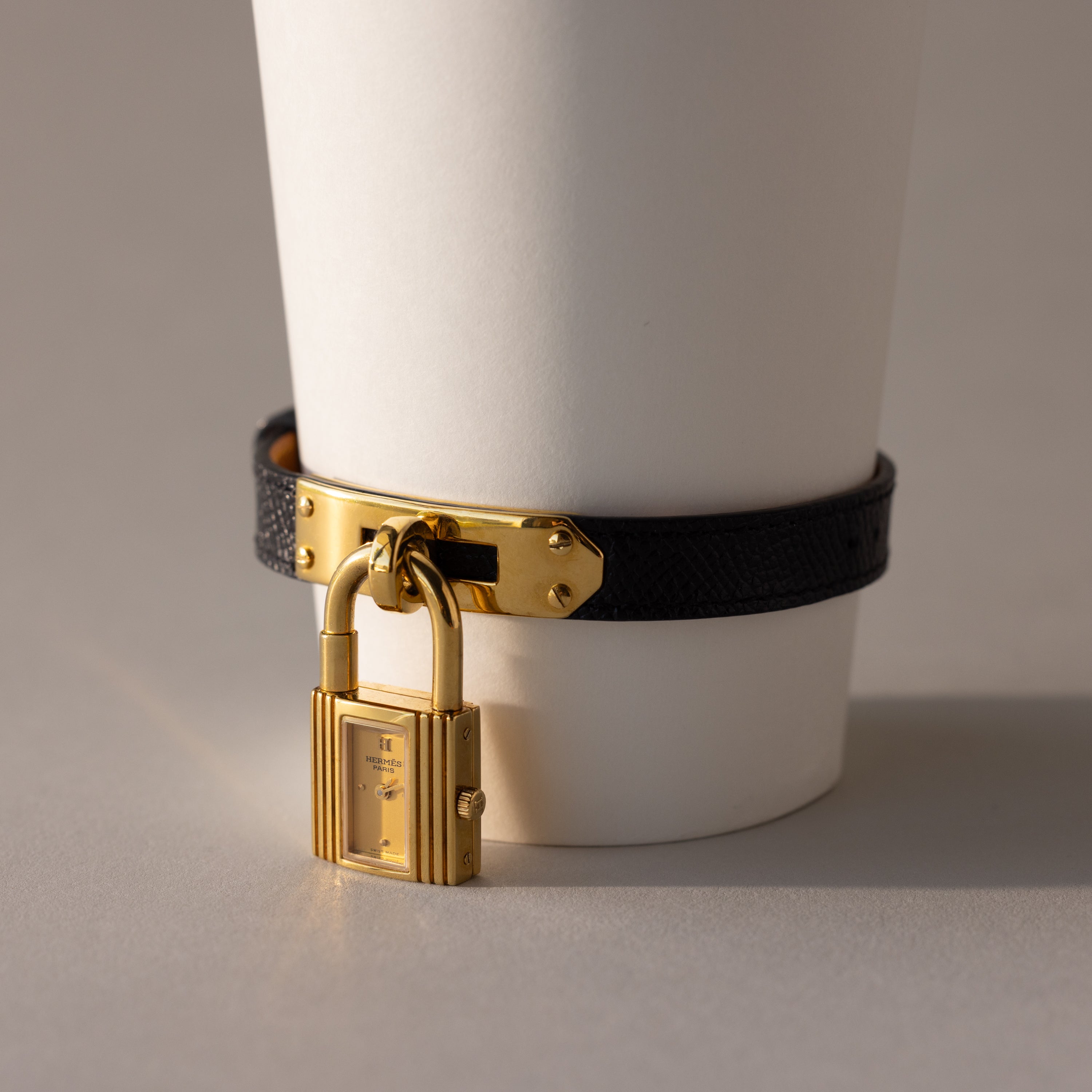 HERMES ゴールドロックデザイン腕時計　レディース Vintage Hermes Swiss Kelly II Lock Women's Watch | Caitlyn Minimalist