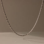 The Bold Link Chain Necklace in Silver stands out against a plain, neutral background.