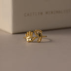 The Hand & Footprint Duo Name Ring in 18K Gold, engraved with a tiny hand and foot plus the name PAIGE, makes a perfect keepsake gift for new parents, beautifully capturing precious memories on a neutral surface.