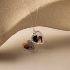 Close up photo of the inside of our Handwriting Heart Locket Necklace in Silver