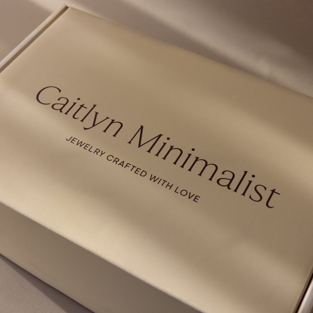 Cream-colored Gift Box Add-On labeled "Jewelry Crafted With Love" in elegant font, featuring refined gift wrapping for a special finishing touch.