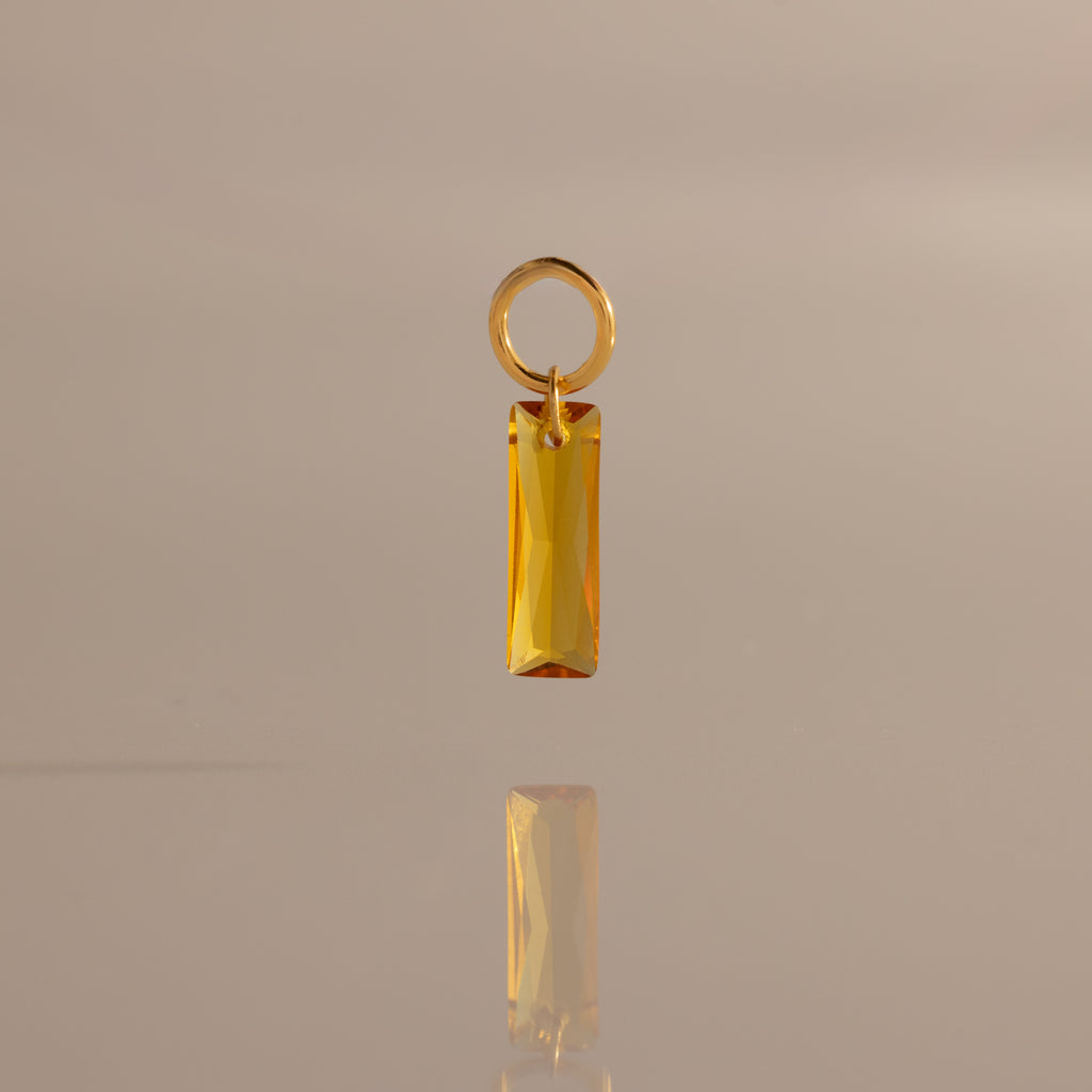 Skinny Baguette Topaz Charm