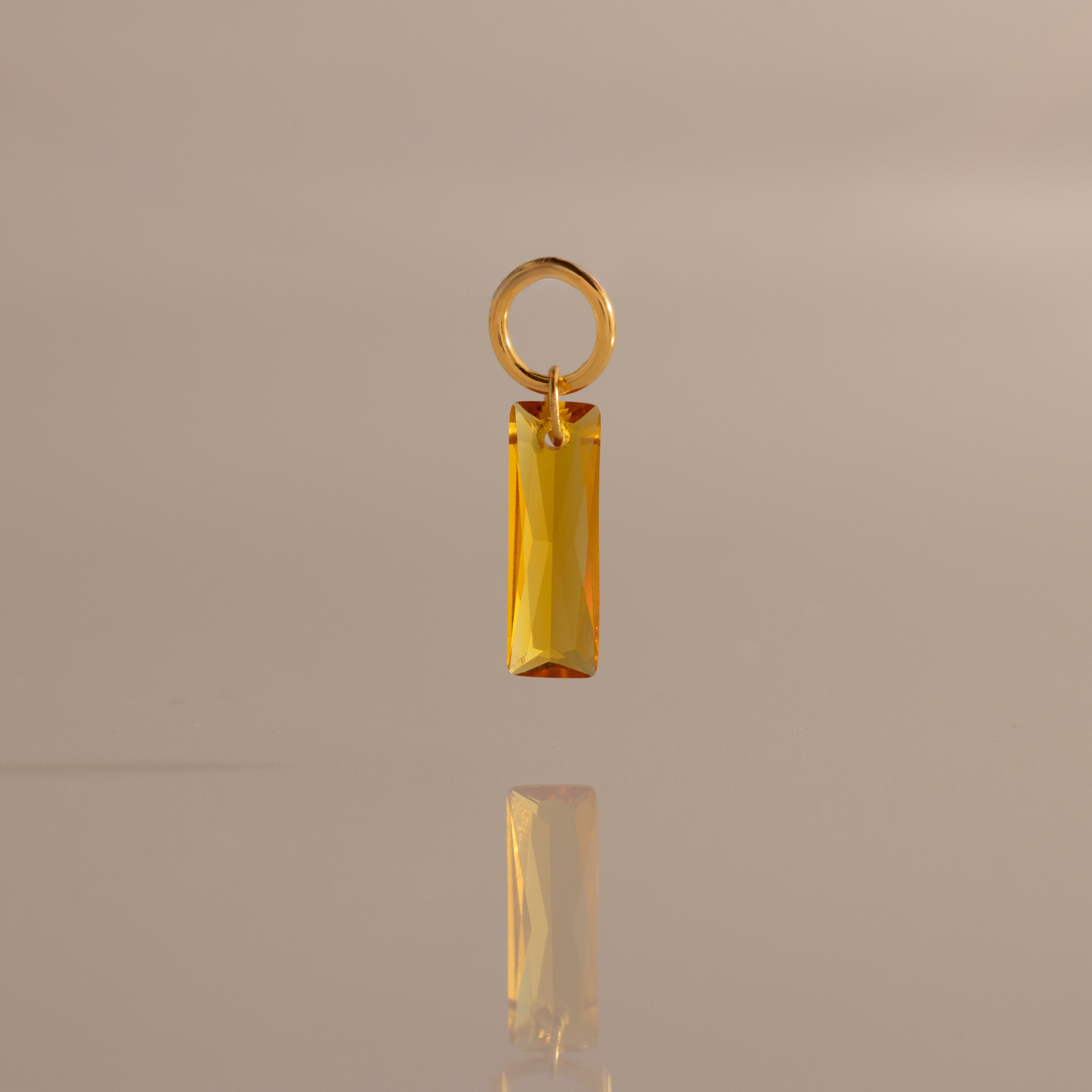 Skinny Baguette Topaz Charm