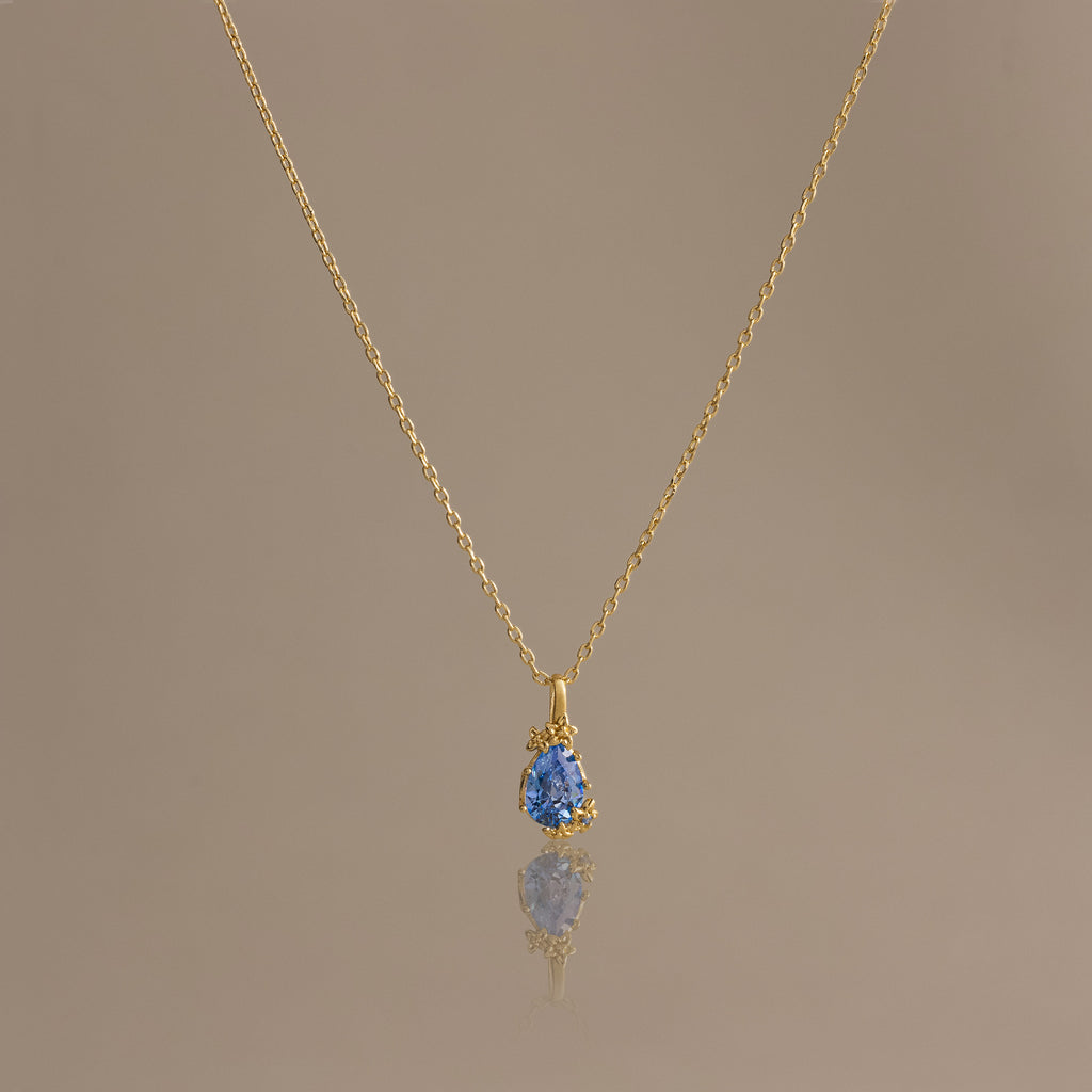 Blue Zircon Blossom Charm Necklace