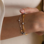 Model wearing Mixed Metal Star Bracelet.