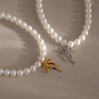 One gold and one silver Bow Pearl Bracelet positioned side-by-side on a neutral background.