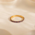 Anillo Eternity con piedra natal de tenis 