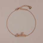 Cursive Name Bracelet in Rose Gold featuring "Cecilia" in elegant script on a neutral background. This personalized name jewelry is perfect for daily wear or as a thoughtful gift.