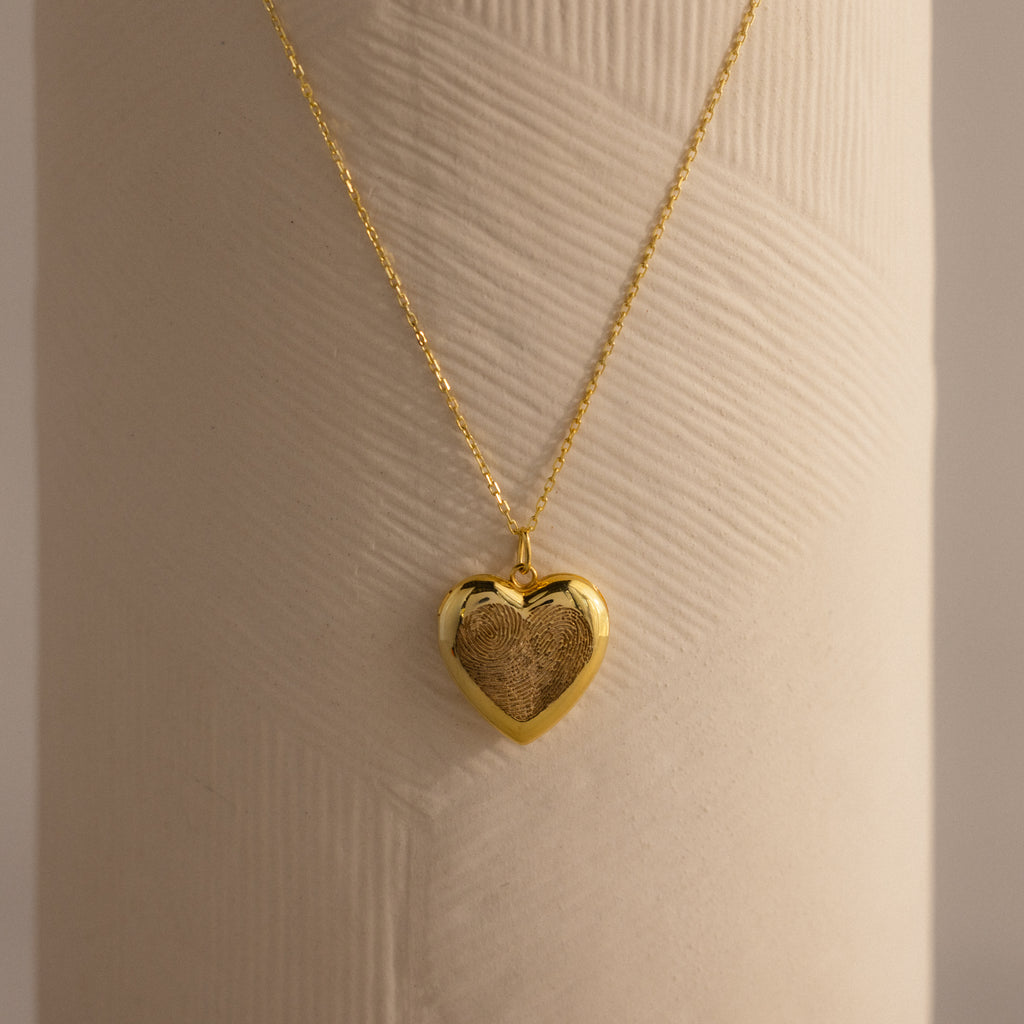 Close up of our Fingerprint Heart Locket Necklace in Gold