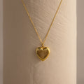 Close up of our Fingerprint Heart Locket Necklace in Gold