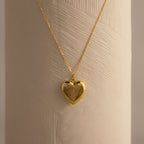 Close up of our Fingerprint Heart Locket Necklace in Gold