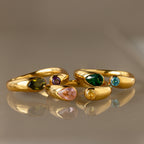 The Toi et Moi Birthstone Signet Ring shines with vibrant green, pink, blue, yellow, and purple gemstones. Celebrate your unique style and story with this customizable gemstone ring.
