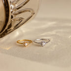 The Vintage Pave Pearl Ring in 18K Gold showcases a central pearl with pavé diamonds in a square setting on a reflective gold band—an elegant and exquisite Christmas gift choice.