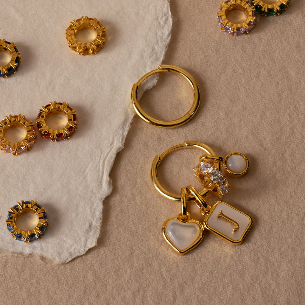 Infinity Blue Zircon Charm