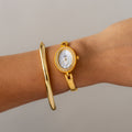 Vintage Takeo Nishida Oval Gold Watch