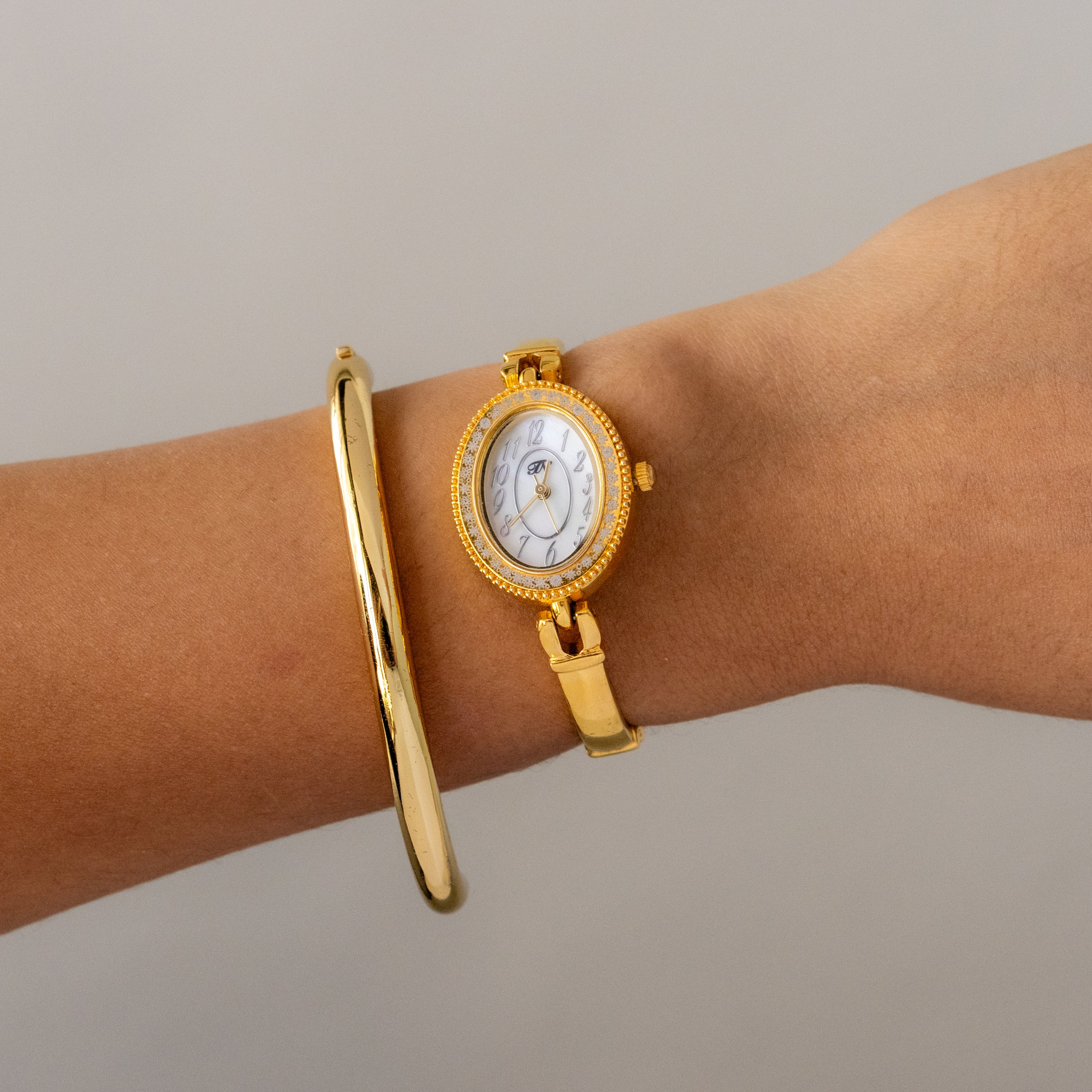 Vintage Takeo Nishida Oval Gold Watch