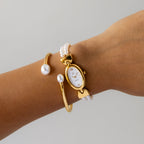 Vintage Taski Oval Pearl Gold Watch