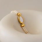 Vintage Taski Oval Pearl Gold Watch