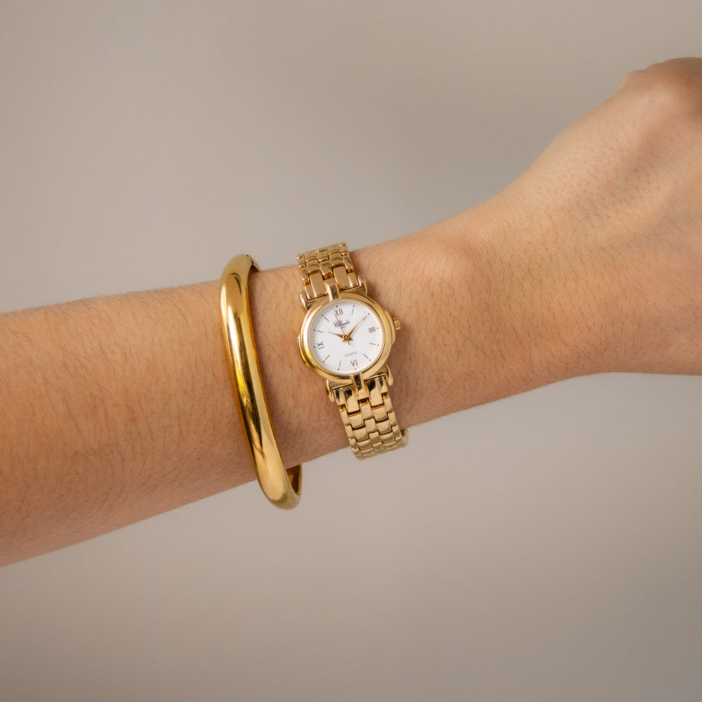 Vintage Claudio Round Gold Watch