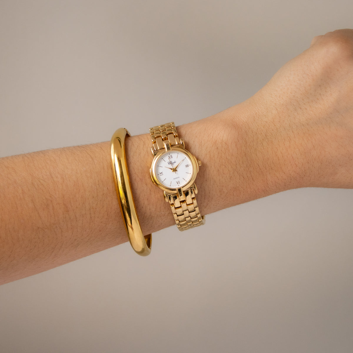 Vintage Claudio Round Gold Watch