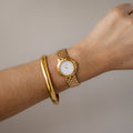 Vintage Delvina Bold Round Gold Watch