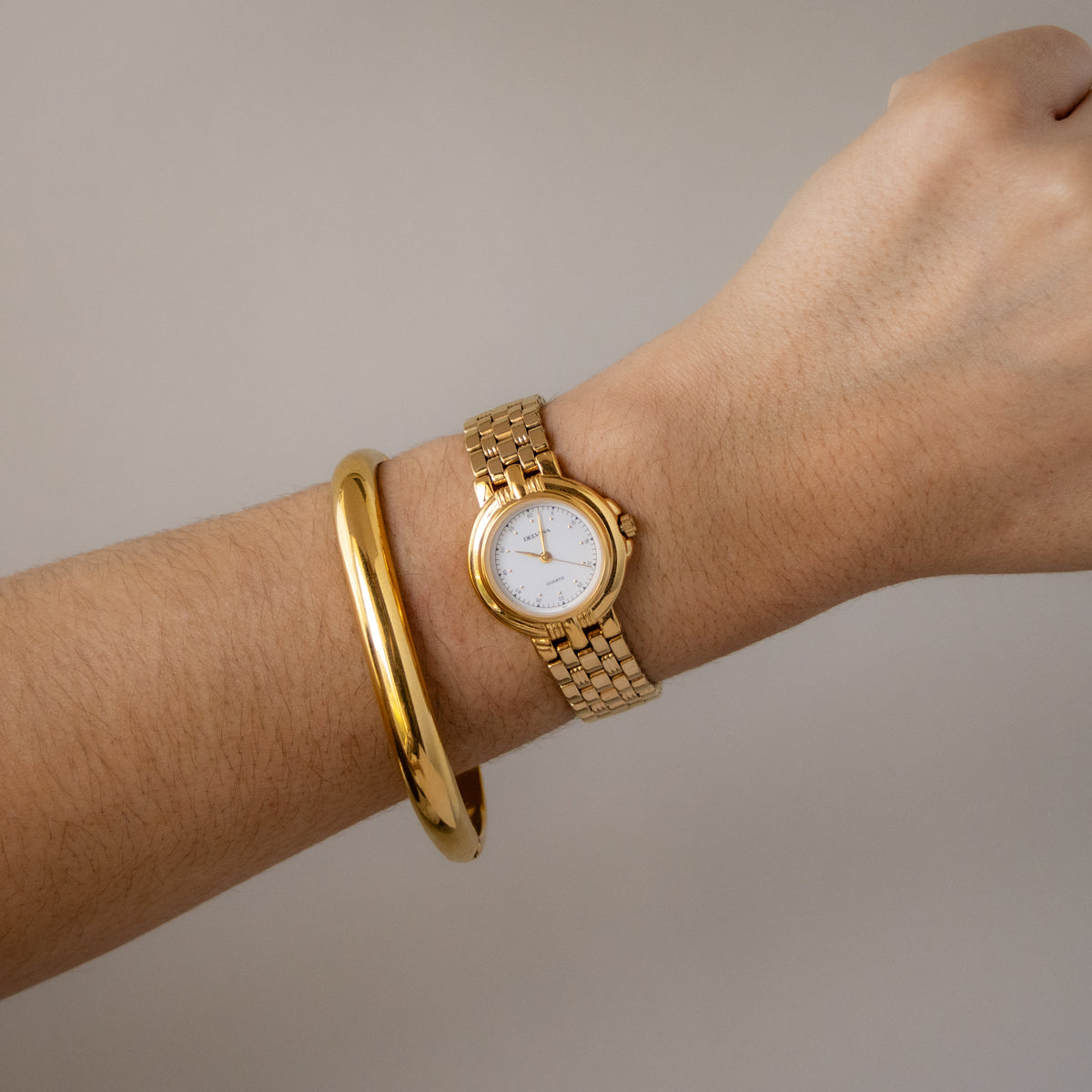 Vintage Delvina Bold Round Gold Watch