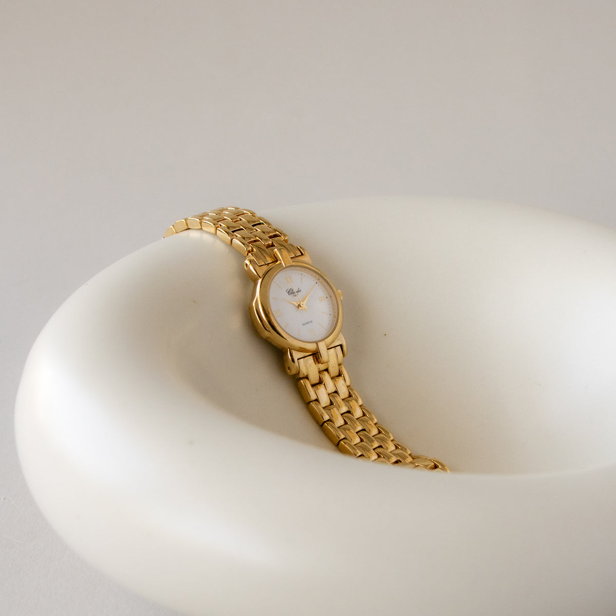 Vintage Claudio Round Gold Watch