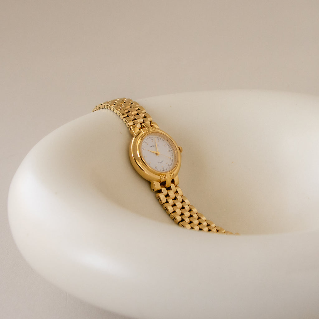 Vintage Delvina Bold Round Gold Watch