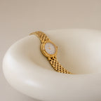 Vintage Delvina Bold Round Gold Watch