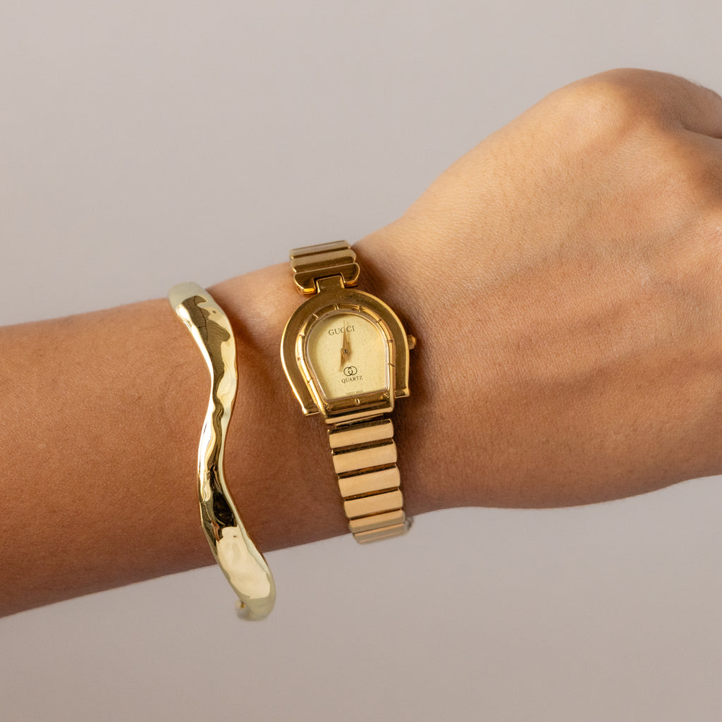 Vintage Gucci Swiss Horseshoe Ribbed Gold Watch