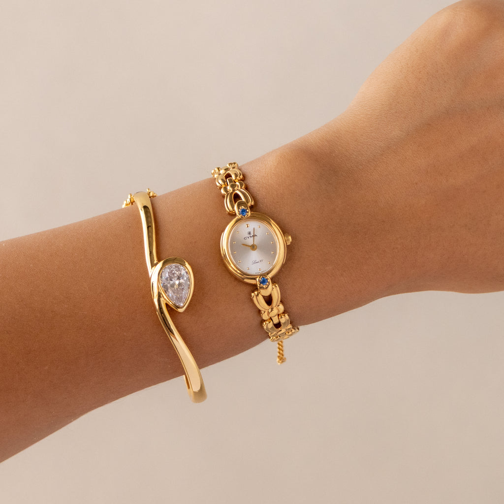 Vintage CYMA Round Sapphire Gold Watch
