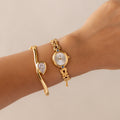 Vintage CYMA Round Sapphire Gold Watch