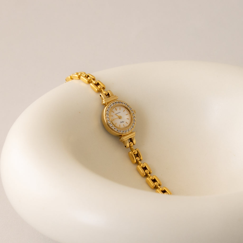 Vintage Technos Swiss Pave Round Gold Watch