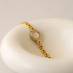 Vintage Technos Swiss Pave Round Gold Watch