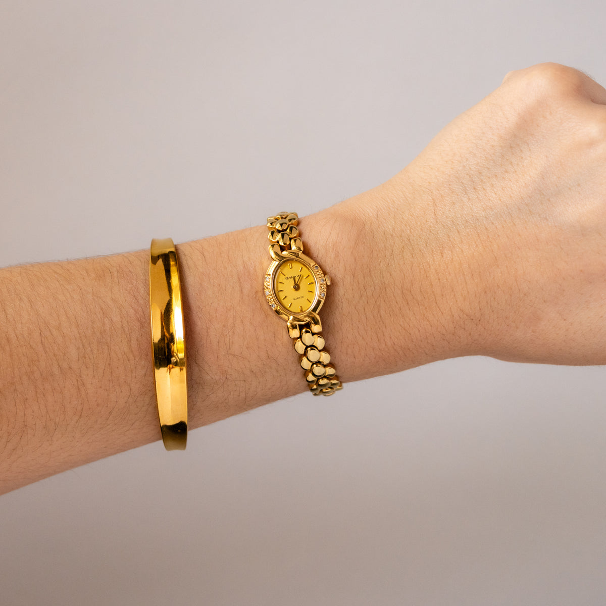 Vintage Rolens Oval Pave Gold Watch