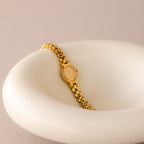 Vintage Rolens Oval Pave Gold Watch