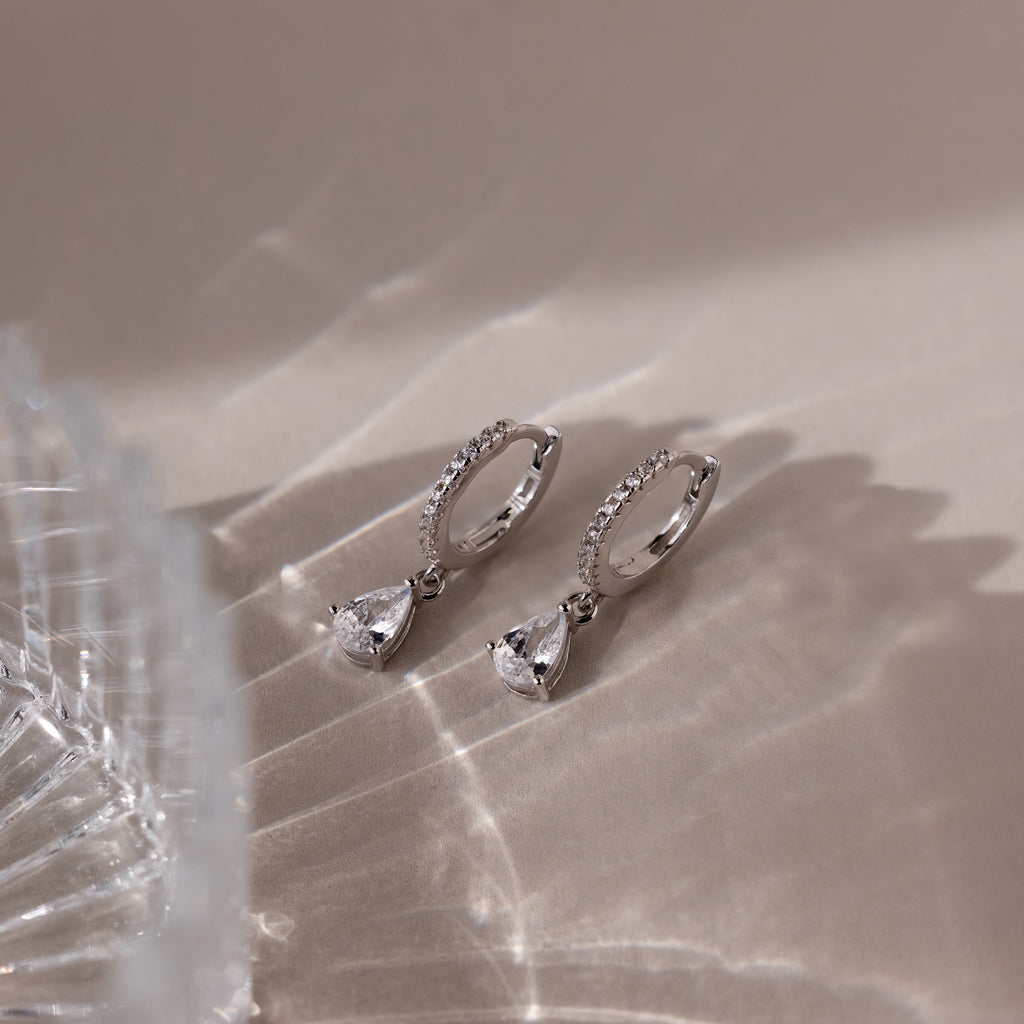 Diamond Drop Huggies in Silver