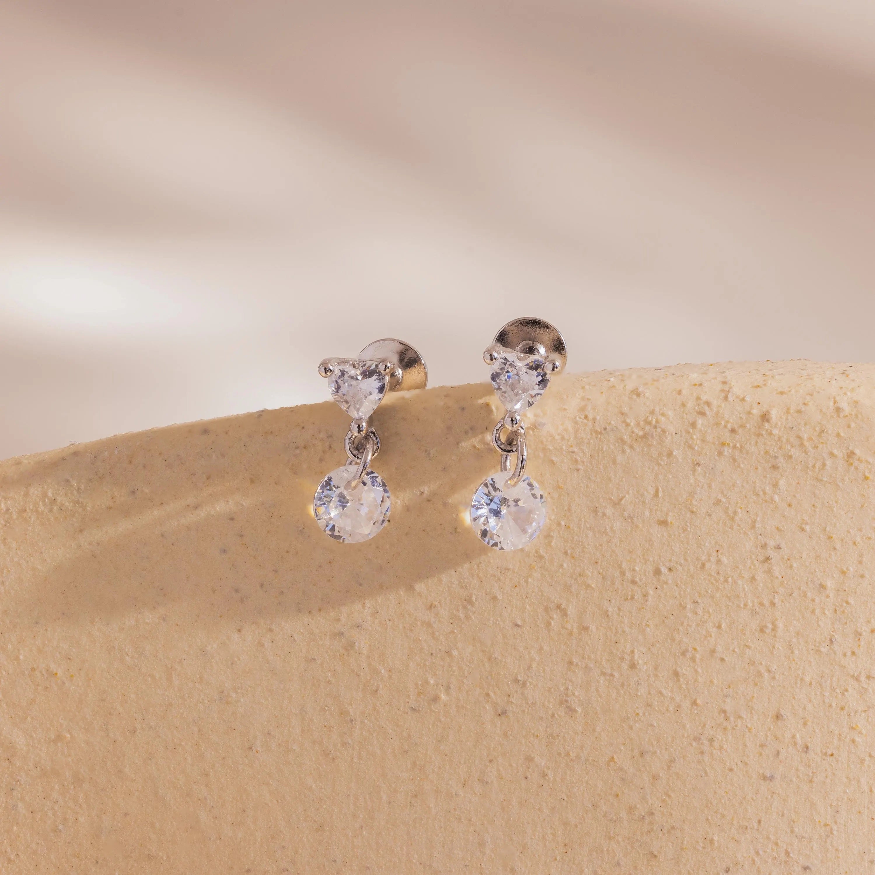 sterling silver flat back earrings with heart-shaped studs and clear crystal drops