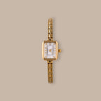 Divine Rectangular Link Timepiece with polished gold-tone case, white dial, and delicate link bracelet.