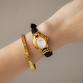 Vintage Fendi Swiss Oval Black Strap Gold Watch