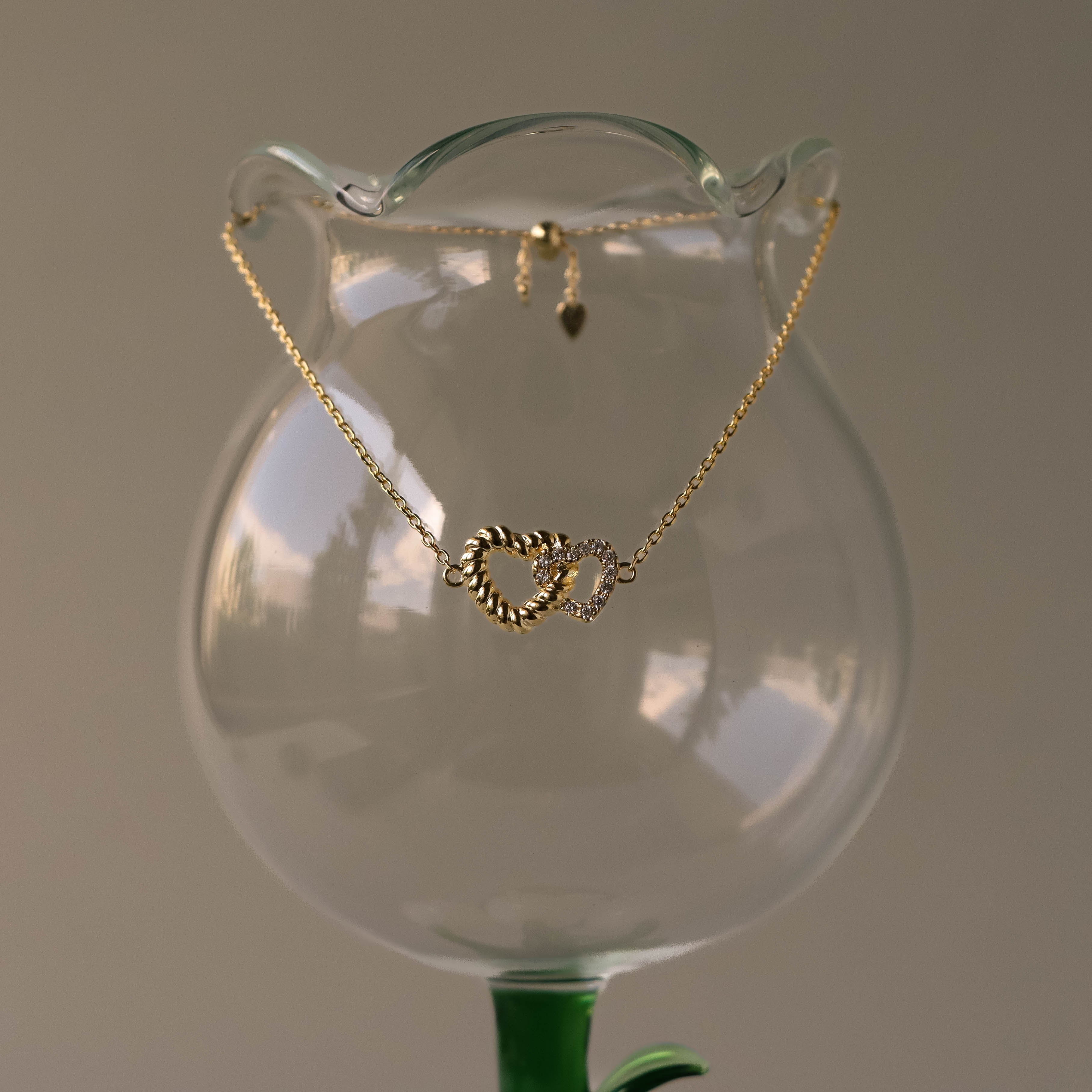 Twisted Pave Interlocking Hearts Bracelet