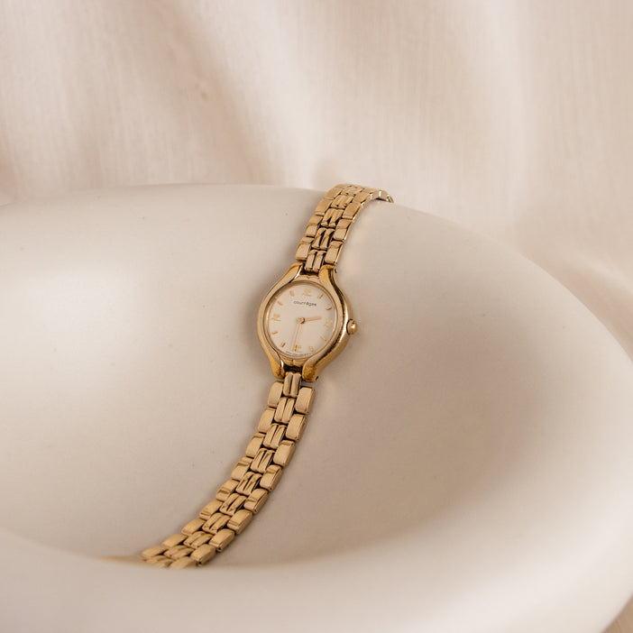 Vintage Courreges Motif Round Gold Watch