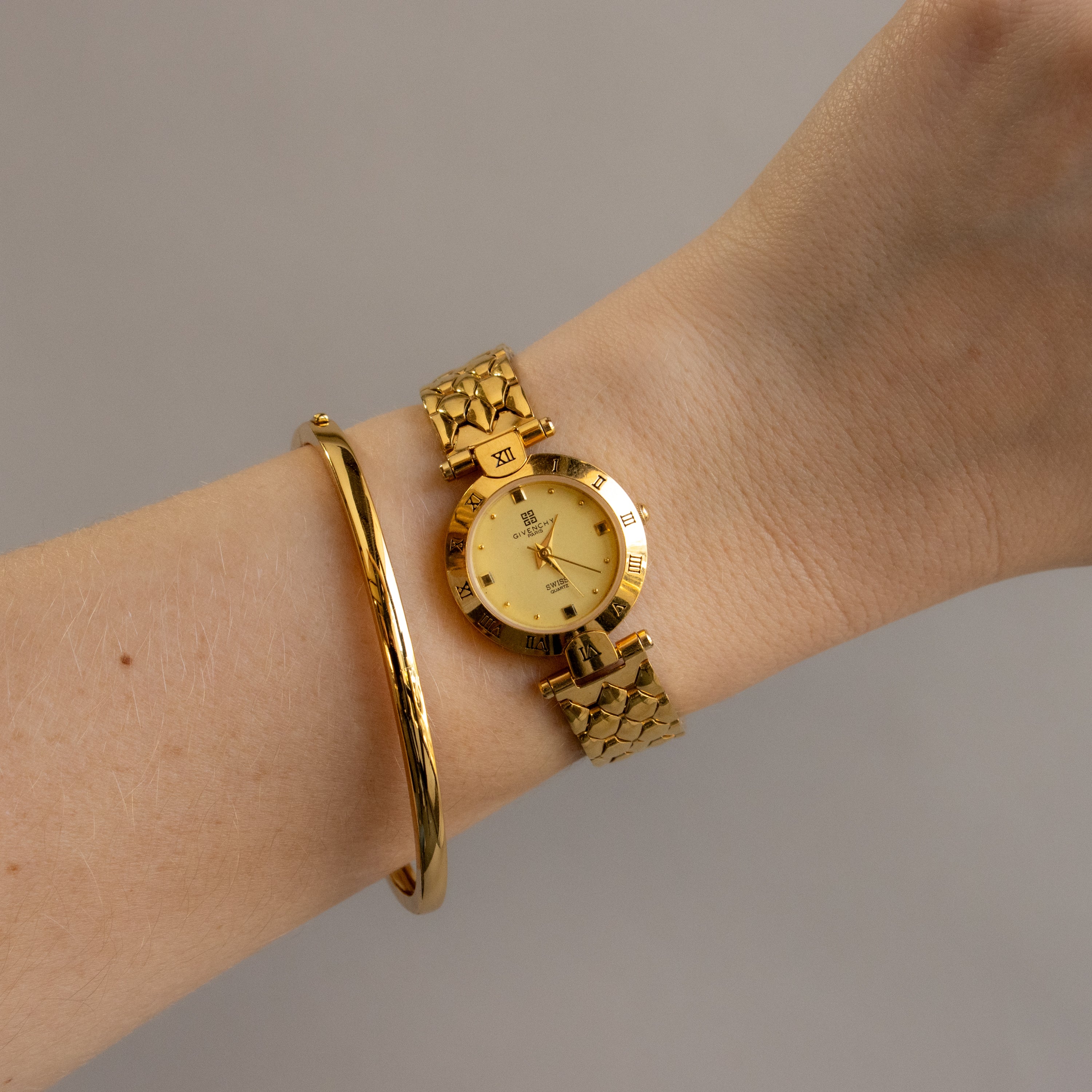 Vintage Givenchy Swiss Round Gold Watch