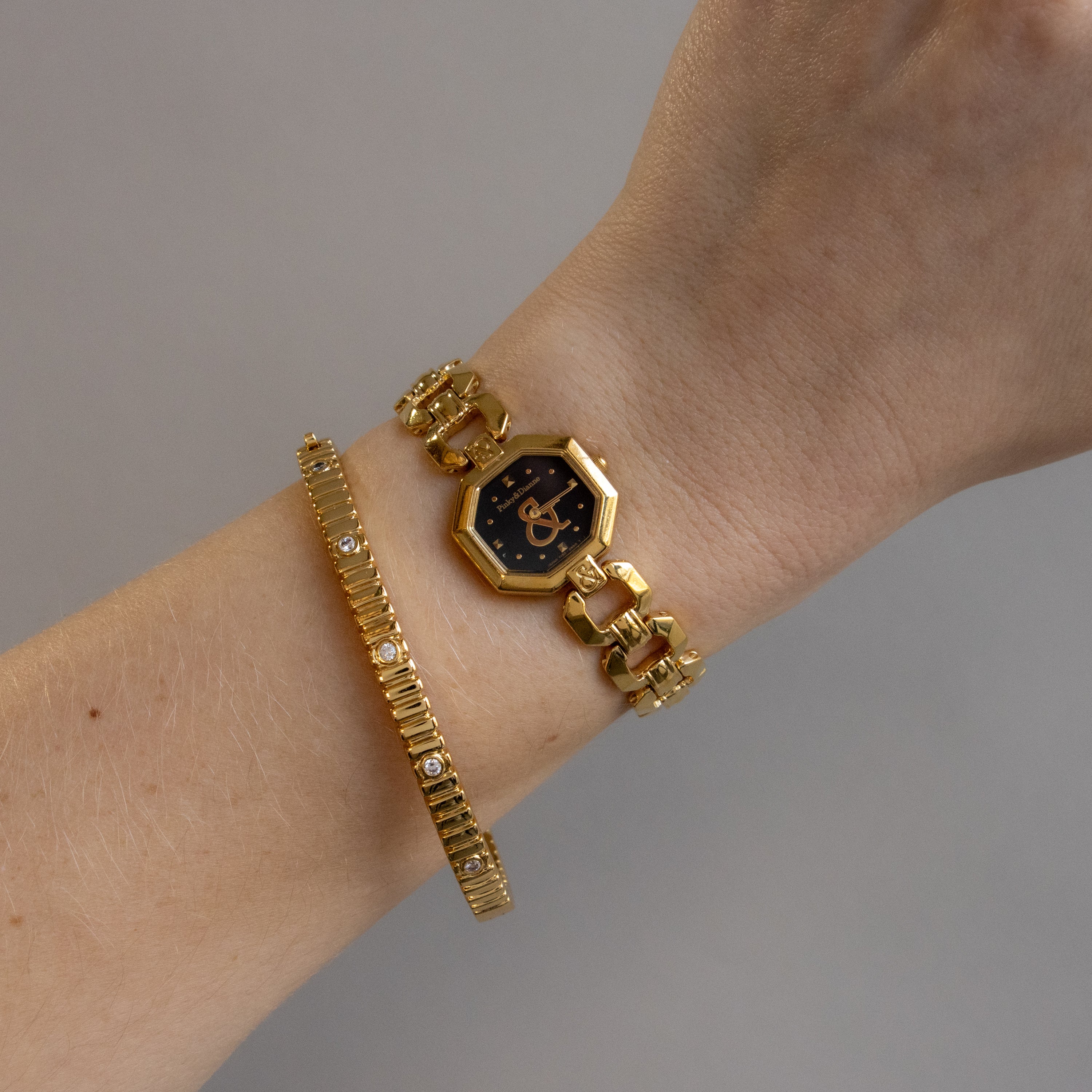 Vintage Pinky & Dianne Midnight Gold Watch