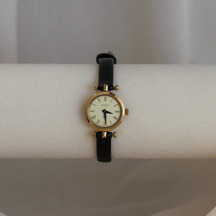 Vintage Gucci Swiss Round Black Strap Watch